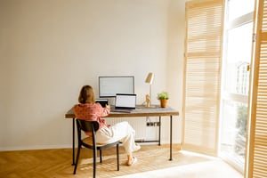 woman-works-online-computers-home